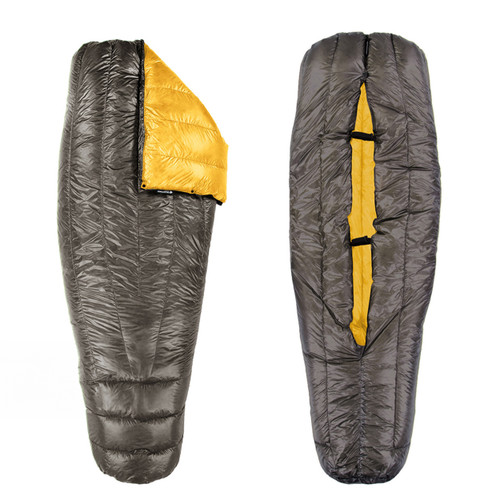 slightly open view of the front and backside of a charcoal shell lightweight down sleeping bag quilt with a yellow interior